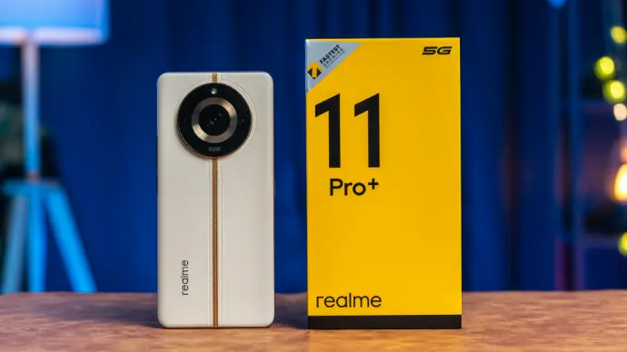 a camera sitting on top of a table next to a box